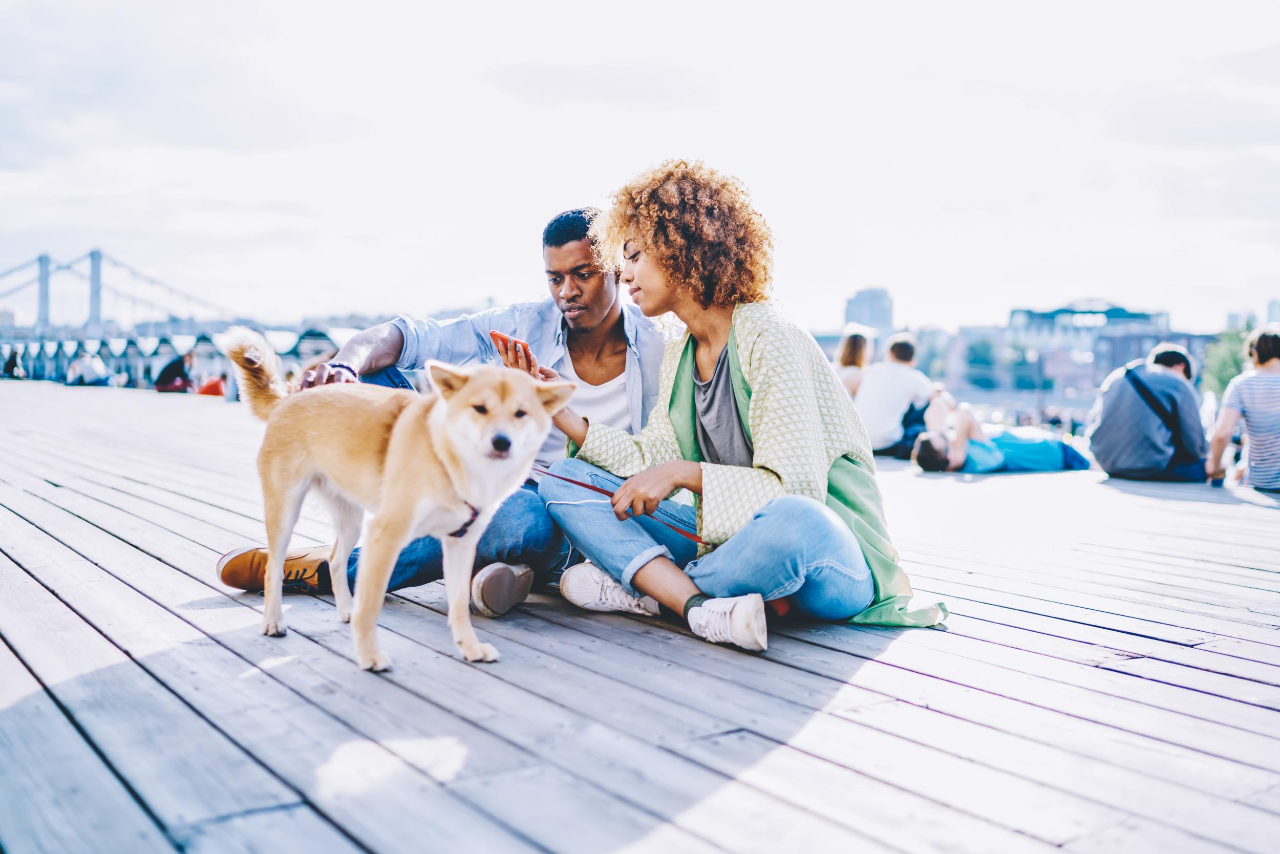 Young Couple with Tan Dog